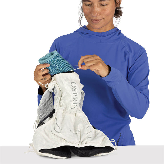 Mystery White upper back pocket  with internal cord in use