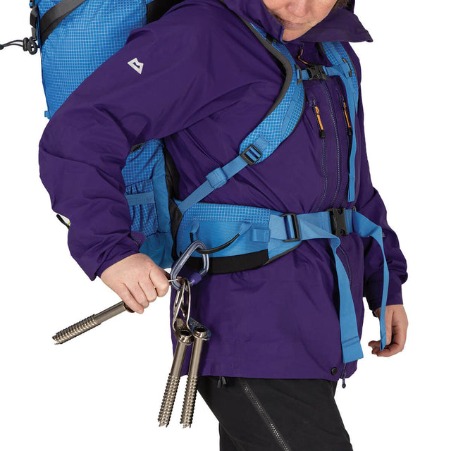 Blue Flame right side hipbelt gear loop in use with carabiner and ice screws