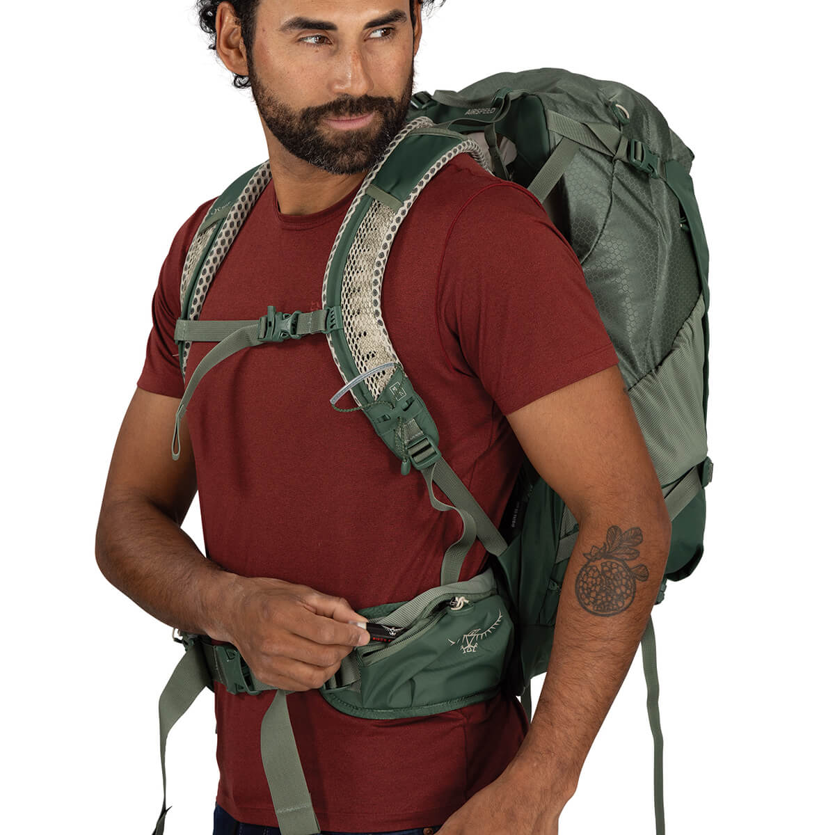 Pine Leaf Green left hipbelt pocket in use