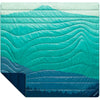 Seascape Ridge Mountains laid out with bottom left corner showing reverse side colour