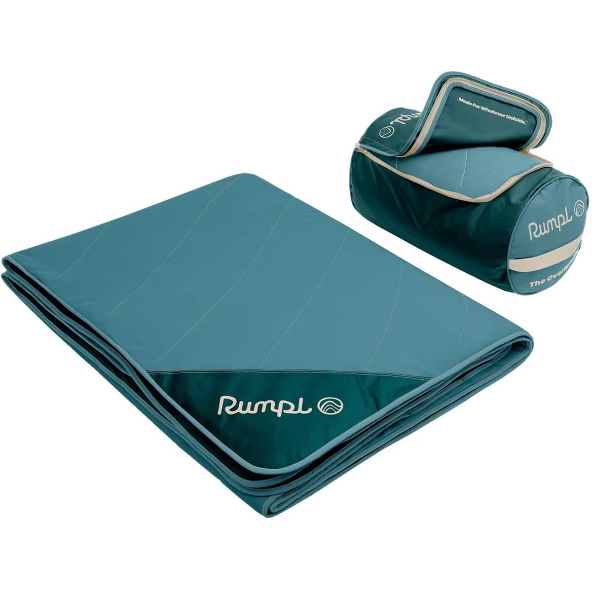 Sage Green folded next to a mat shown packed in stuff sack 