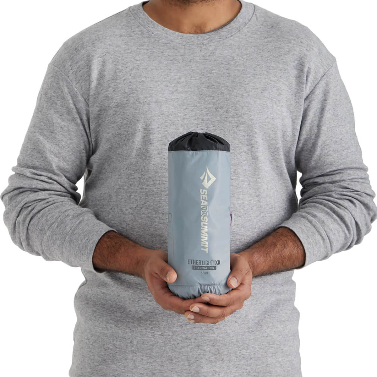Small packed and held by model