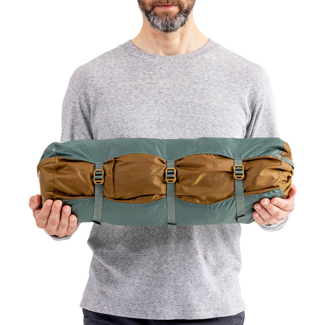 Stowed and held by model