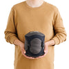 Packed in compression sack and held in hand as an idea of stowed size